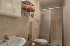  Ferienwohnung KWE 17EG Graal-Müritz Küstenwald - Badezimmer