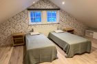  (35) Ferienhaus Viken am See Bunn in Schweden Smaland - Die 2 Einzelbetten im Schlafloft der offen mit dem Wohnzimmer verbunden ist