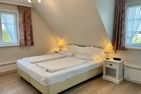 Haus an den Wiesen Austernperle Tinnum - Schlafzimmer