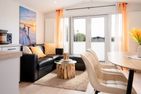 Ostseecamp Ferienhaus "Pier 99" (99) Scharbeutz - Wohnzimmer