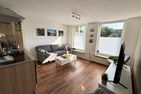  Ferienwohnung Lüttje Delftkamerke Ostfriesland - Wohnzimmer