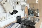  Ferienwohnung Lüttje Delftkamerke Ostfriesland - Küche / Küchenzeile