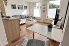  Ferienwohnung Lüttje Delftkamerke Ostfriesland - Wohnzimmer