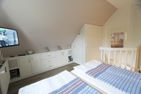 Beachdarling - Im Grund 25, App. 4 Wenningstedt - Schlafzimmer