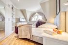  Ferienhaus Haubenlerche 20 Fuhlendorf - Schlafzimmer