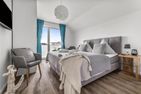  Ferienwohnung Sunset Suite Olpenitz Ostseeresort Olpenitz - Schlafzimmer