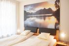 Haus Am Raineck 25 Ferienwohnung Karwendelstern (625)  - Schlafzimmer