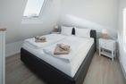  Strandquartier Dünenblick Norderney - die insellotsen Norderney / Strandquartier Dünenblick - Schlafzimmer 1