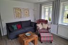 Dorfhüs Eiderente Nebel/Süddorf - Wohnzimmer