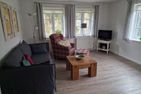 Dorfhüs Eiderente Nebel/Süddorf - Wohnzimmer