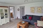 Dorfhüs Eiderente Nebel/Süddorf - Wohnzimmer