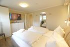 Cosima - Im Grund 29,  App. 79 Wenningstedt - Schlafzimmer