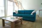  Ferienwohnung Pamirhuus Norderney - Wohnzimmer
