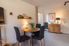  Ferienhaus Seesucht Krummhörn - Wohnzimmer