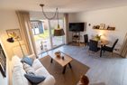  Ferienhaus Seesucht Krummhörn - Wohnzimmer