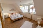  Ferienhaus Seesucht Krummhörn - Schlafzimmer