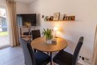  Ferienhaus Seesucht Krummhörn - Wohnzimmer