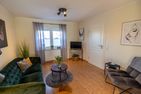  Ferienhaus Klötzlehuus Krummhörn - Wohnzimmer