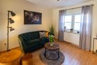  Ferienhaus Klötzlehuus Krummhörn - Wohnzimmer