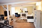  Ferienhaus Heimathafen Bordelum Nordfriesland - Wohnzimmer