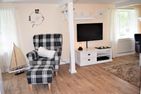  Ferienhaus Heimathafen Bordelum Nordfriesland - Wohnzimmer