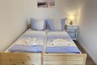 Haus Seeigel Ferienwohnung Stranddistel Norderney - Schlafzimmer