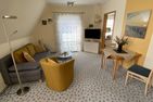  Ferienwohnung Wasserturm Norderney - Wohnzimmer