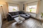  Ferienwohnung Ant Dopke Krummhörn - Wohnzimmer