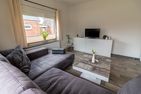  Ferienwohnung Ant Dopke Krummhörn - Wohnzimmer