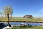  Ferienwohnung Blinkfüer Ostfriesland - Gartenblick