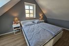  Ferienhaus Mühle 5 Ostfriesland - Schlafzimmer