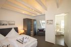  Haus Emilia App. Leuchtturm Hafennähe/Ostseite - Schlafzimmer