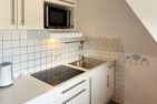 Hüs Sanskiin Ferienwohnung *Driiwholt* Süddorf auf Amrum - Küche / Küchenzeile