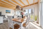  Ferienhaus Strandläufer Olpenitz Ostseeresort Olpenitz - Wohnzimmer