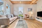  Ferienhaus Seaside Cottage Olpenitz Ostseeresort Olpenitz - Wohnzimmer