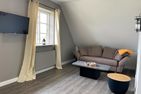  Ferienwohnung Gotteskoog im Reetdachhaus Bongsiel Dagebüll - Wohnzimmer