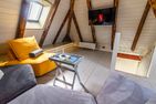  Ferienhaus Lüsthuus Krummhörn - Wohnzimmer