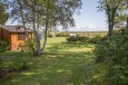  Haus Pesel - Abendsonne Norddorf - Garten und Meerblick im Garten der Ferienwohnung Abensonne