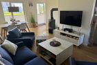  Ferienwohnung Heimathafen Schlei Olpenitz Ostseeresort Olpenitz - Wohnzimmer