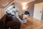  Ferienwohnung Zarah Greetsiel - Wohnzimmer