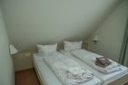  Haus Roseneck Wohnung 5 Norderney - Schlafzimmer