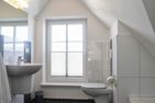  Stadtwohnung 3 Wyk auf Föhr - In dem Badezimmer im DG finden Sie eine Badewanne vor.