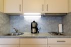 Ferienwohnpark Immenstaad am Bodensee Ein-Zimmer-Apartment 55/32 Bodensee - Küche / Küchenzeile