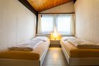 Ferienwohnpark Immenstaad am Bodensee Satteldachhaus (Typ 9) SD 55 Bodensee - Schlafzimmer