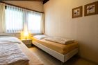Ferienwohnpark Immenstaad am Bodensee Satteldachhaus (Typ 9) SD 55 Bodensee - Schlafzimmer