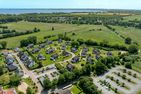  Feriendorf Am Mariannenweg Boltenhagen - Anlage mit Parkplatz