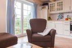  Achterdeck - Hüs in Lee Süddorf - Sessel in der Ferienwohnung Achterdeck