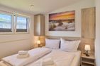Ostseecamp Ferienhaus "Sturmfrei" (133) Scharbeutz - Schlafzimmer