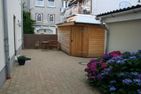  Stadtwohnung 9 Wyk auf Föhr - In unserem Schuppen dürfen Sie gerne Ihren Kinderwagen unterstellen oder auch Strandspielzeug oder PKW-Fahrradträger.