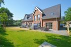  Haus am Leuchtturm Hausteil 4 Wyk auf Föhr - Jede Wohnung verfügt über ihren eigenen Gartenabschnitt.